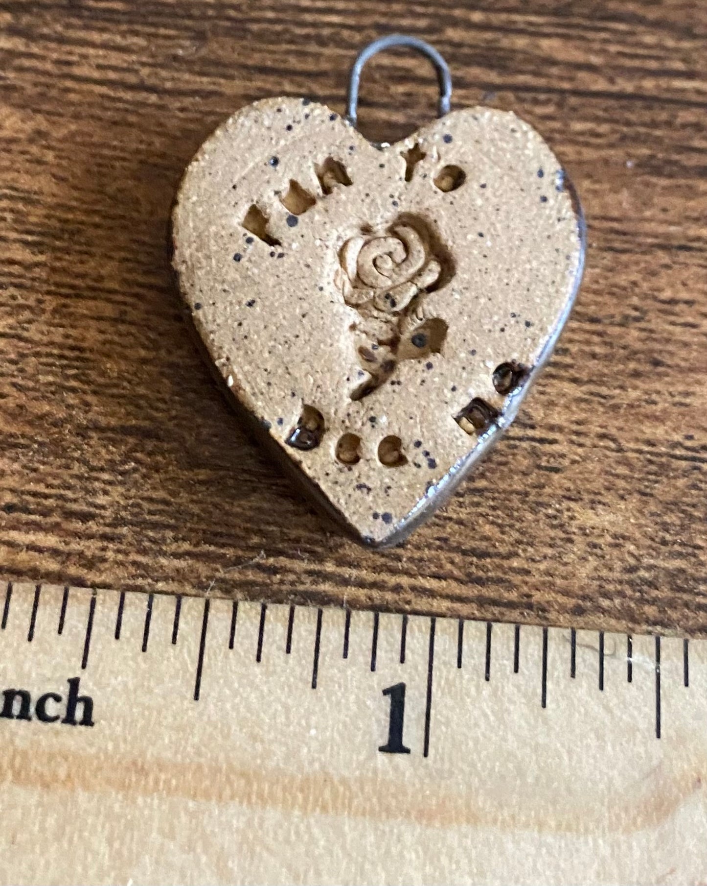 Gold hug pendant