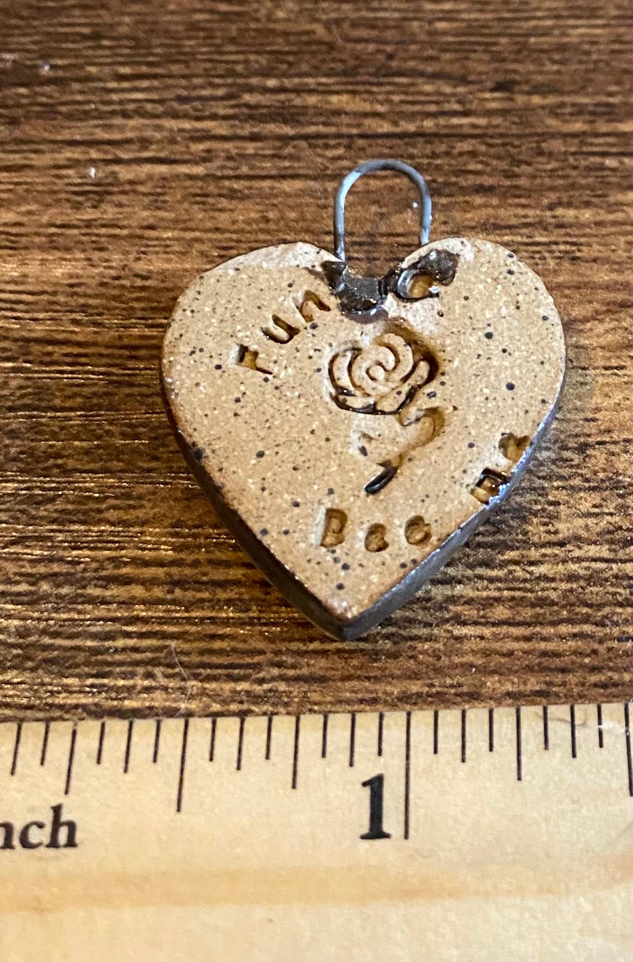 Gold love pendant