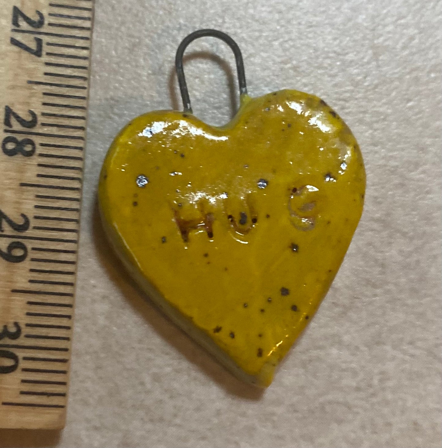 Heart pendant yellow hug